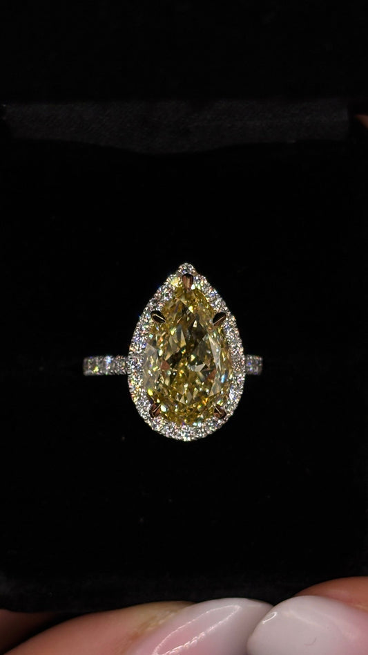 6.00ct Pear Cut (Fancy Yellow Intensive VS1) Diamond Engagement Ring – IGI Certified · Halo & Shank Radiance