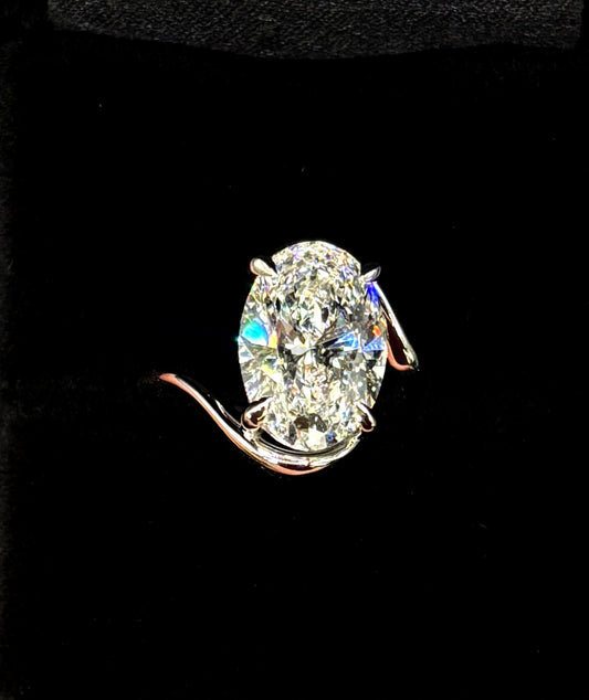 5.00ct Oval Brilliant Cut (D VS1) Diamond Engagement Ring – IGI Certified – Sculptural Bypass Solitaire