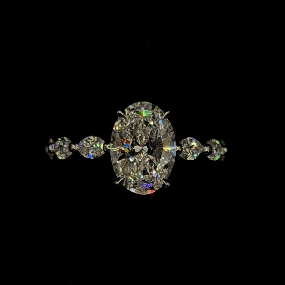2.00ct Oval E VS1 Marquise Shank Diamond Ring – Cathedral Style – IGI Certified